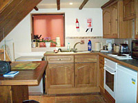 The kitchen at Paradise Cottage, Crimscote Holiday Cottages